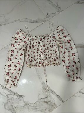Speed Limit MPH Smocked Off-Shoulder Floral Crop Top — White with Pink Roses